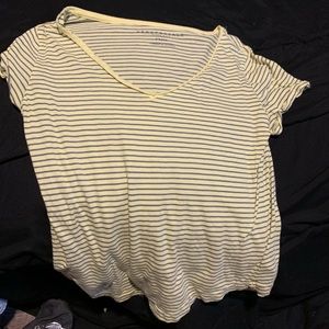 Pale yellow tee shirt